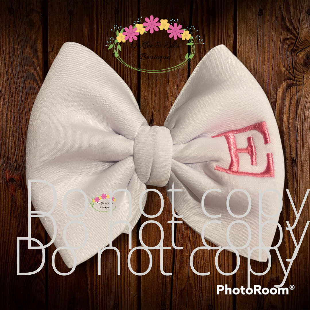 White  puff bow, add monogram