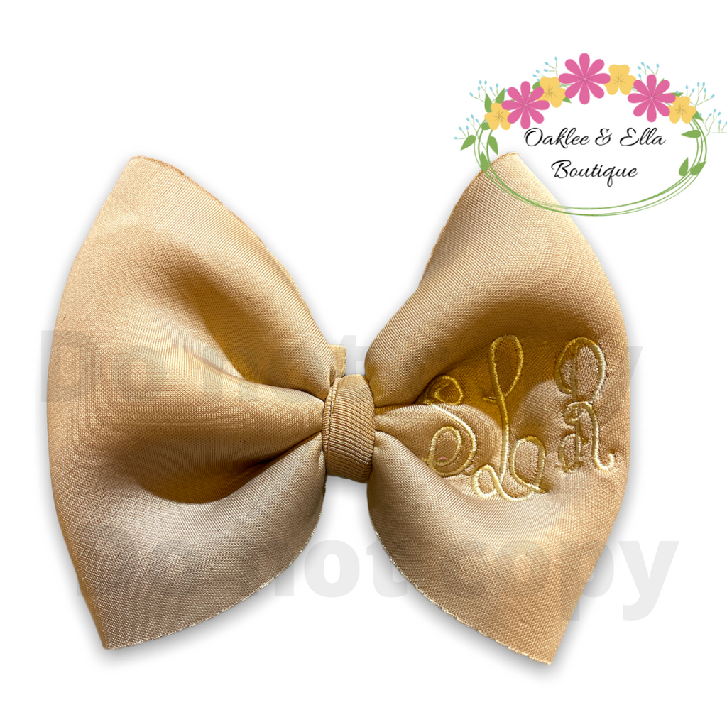 Tan puff bow, add monogram